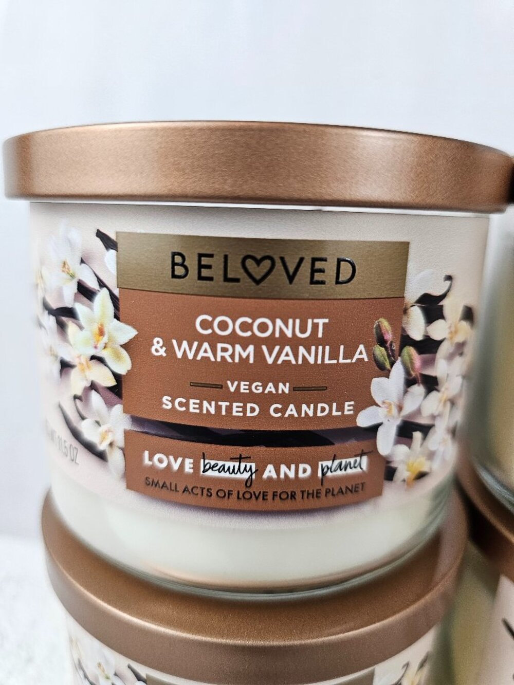 Beloved Coconut & Warm Vanilla scented candle is a 11.5oz vegan soy wax
